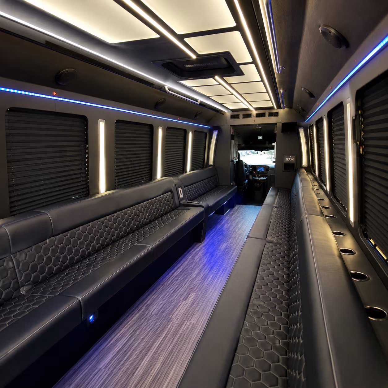 Wedding guests seated inside a party bus serving Nashville